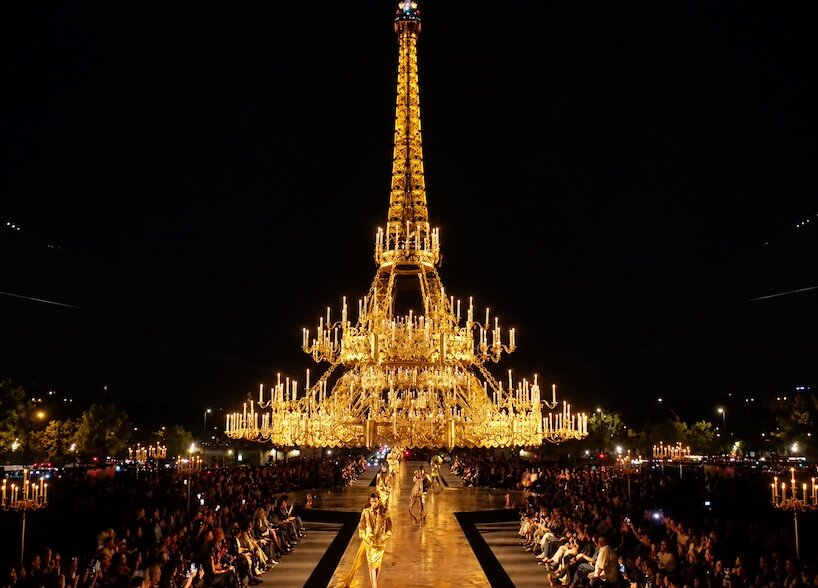 three monumental chandeliers recreate yves saint laurent’s historic paris ballroom at trocadéro