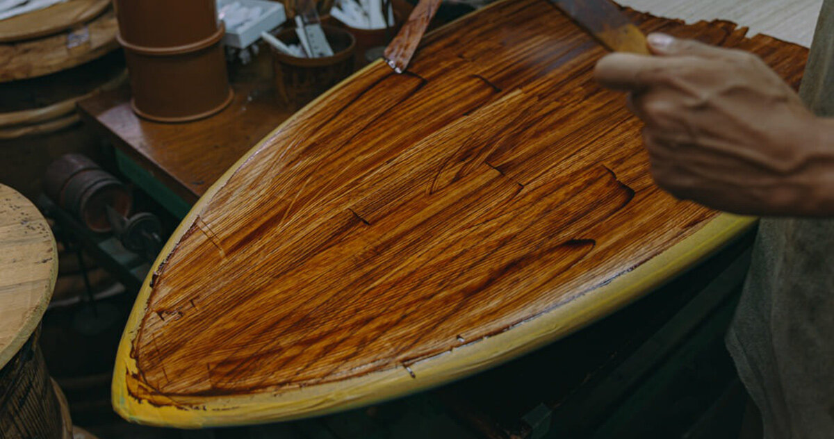 scars left by bears ripple through these japanese cedar surfboards