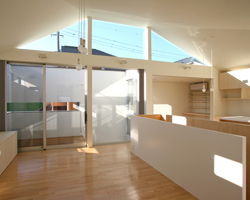 archiplace: house set in a wall