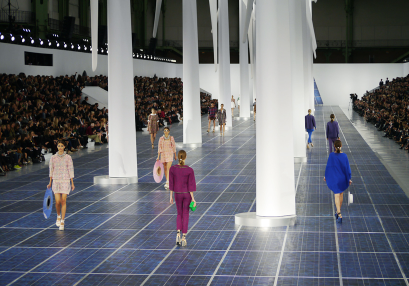 solar panels and wind turbines shape chanel runway at paris fashion week