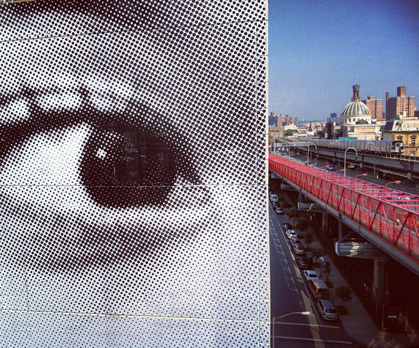 JR's pasting can be seen from new york city's williamsburg bridge
