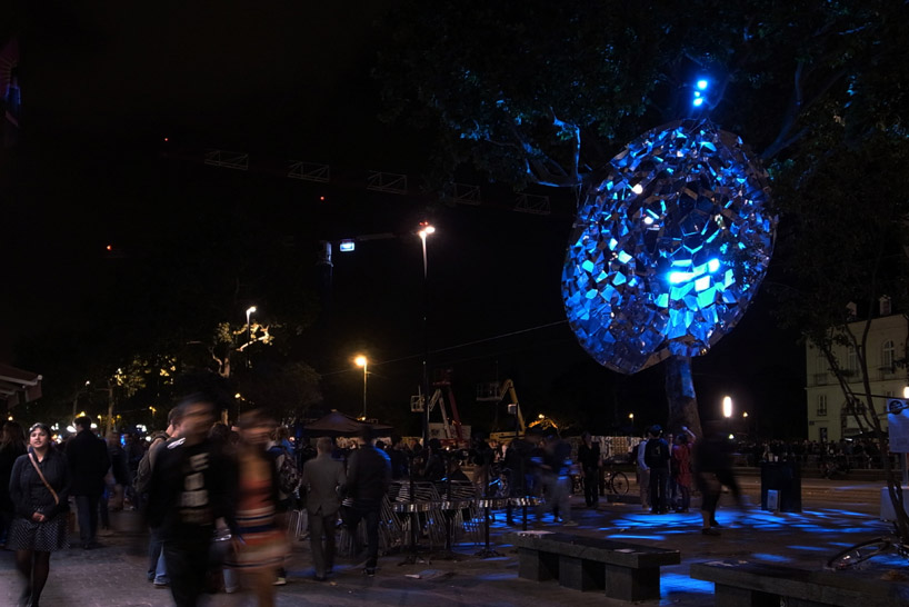 suspended sculpture composed of 1200 mirrors reflects french cityscape