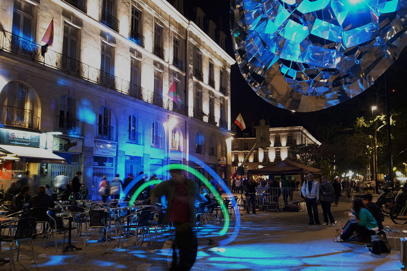 suspended sculpture composed of 1200 mirrors reflects french cityscape
