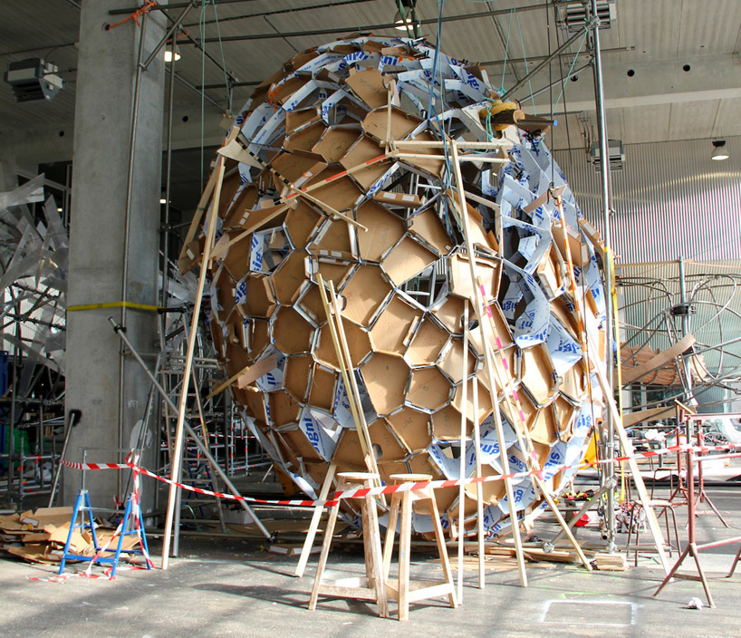 suspended sculpture composed of 1200 mirrors reflects french cityscape