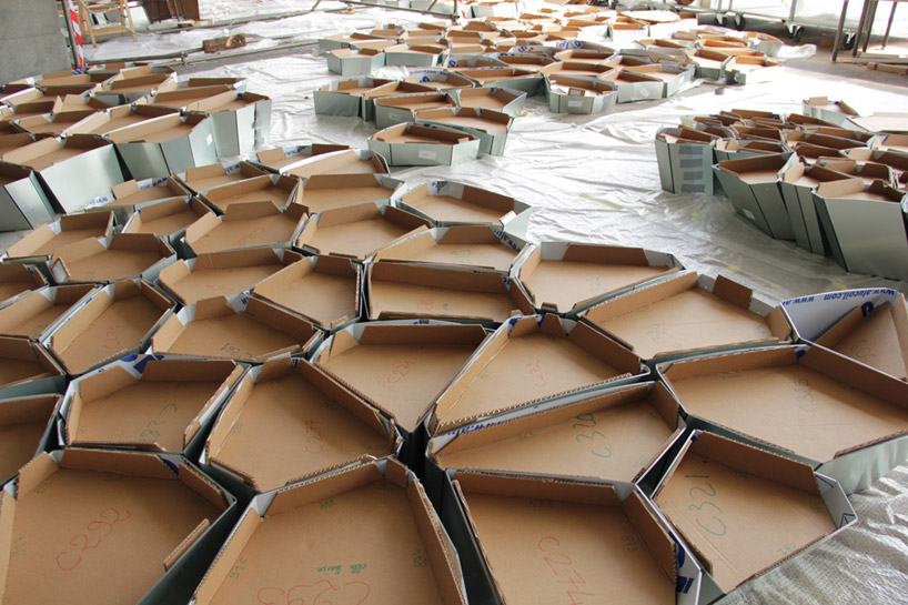 suspended sculpture composed of 1200 mirrors reflects french cityscape