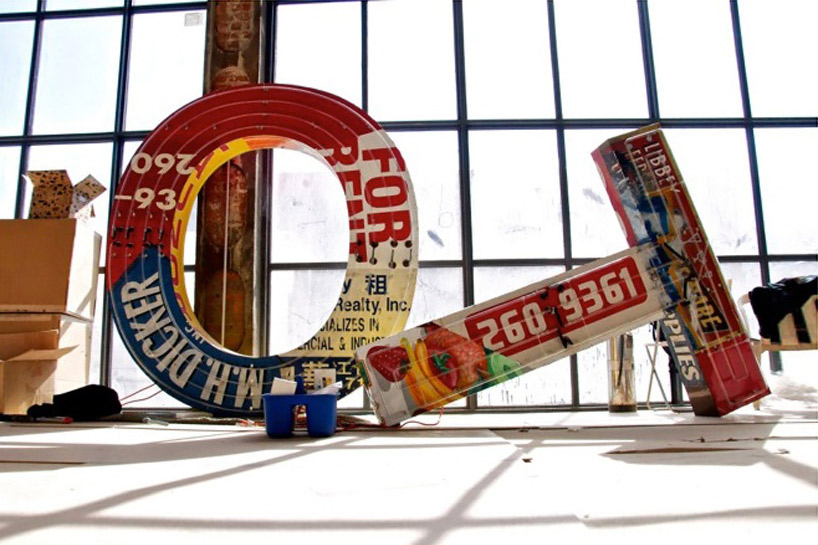 neon HOTEL indicator built from recycled signs by tom fruin