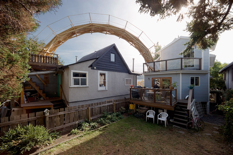 pedestrian residential wooden bridge by reece terris