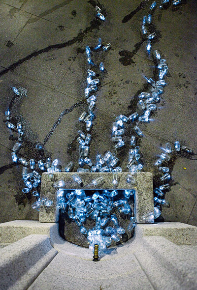 luzinterruptus: drinking water running through the streets