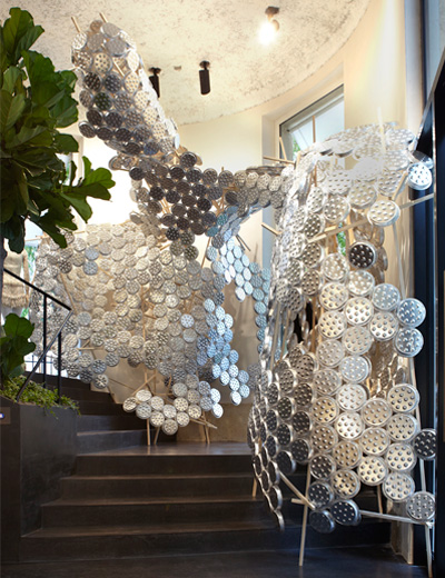 arnold goron: aluminum snail plate installation for isabel marant