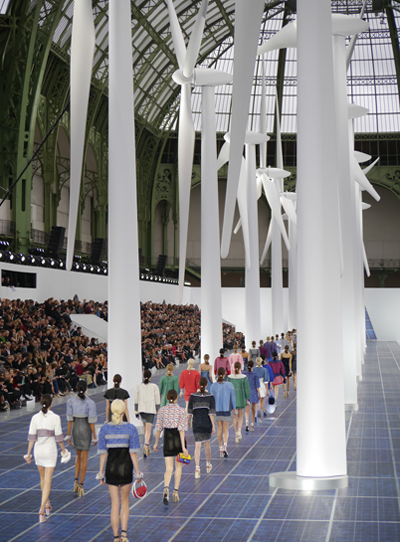 solar panels and wind turbines shape chanel runway at paris fashion week