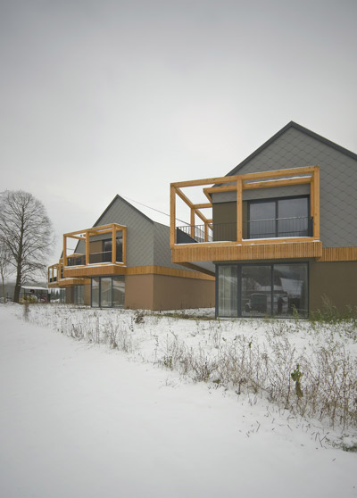 OFIS architects: backbone village houses