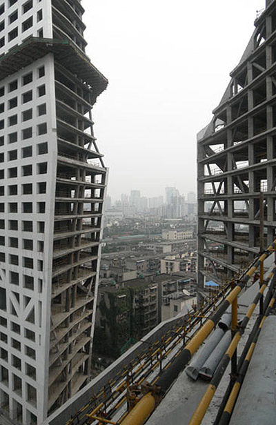 steven holl: sliced porosity block tops out