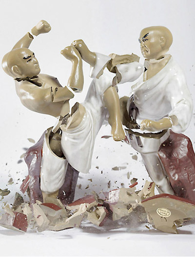 crashing porcelain action figures by martin klimas