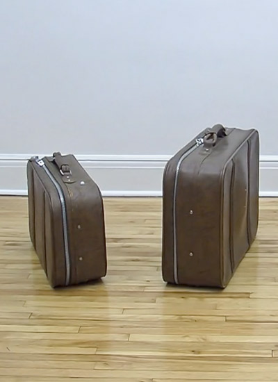 inflated american tourister suitcases by juan ortiz apuy