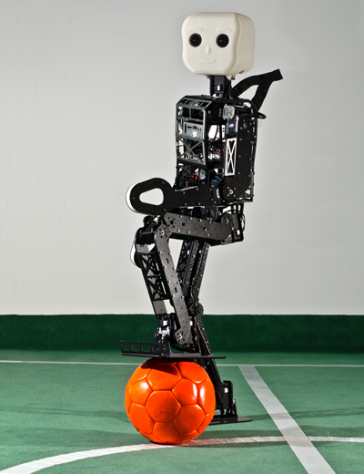 humanoid robot nimbRo OP plays soccer