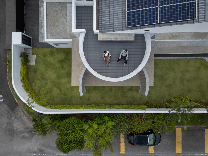 operable metal portal opens fabian tan's kuala lumpur house to the sky