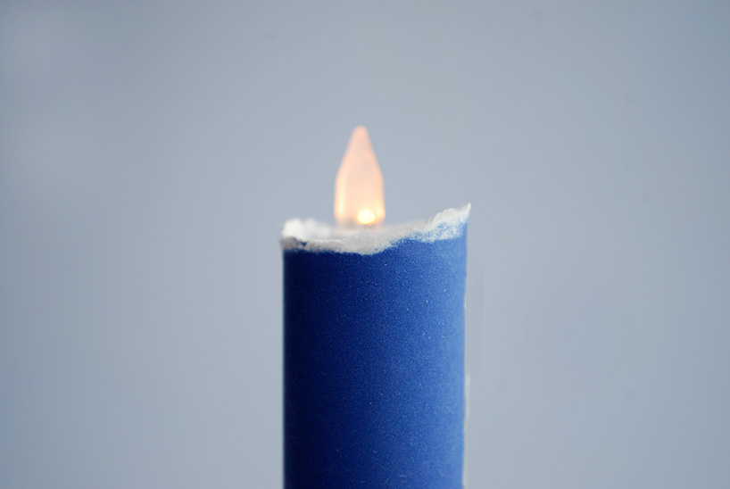 kazuhiro yamanaka rolls A4 paper to create a flickering LED candle designboom