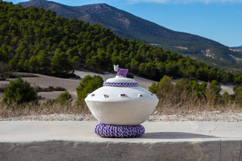 jorge mañes rubio's ceramic vessels pose a ritual offering at a prehistoric cave in spain