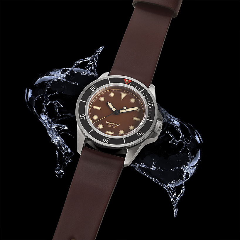 UNIMATIC x massena LAB watch features a unique patina dial and tactile black bezel designboom