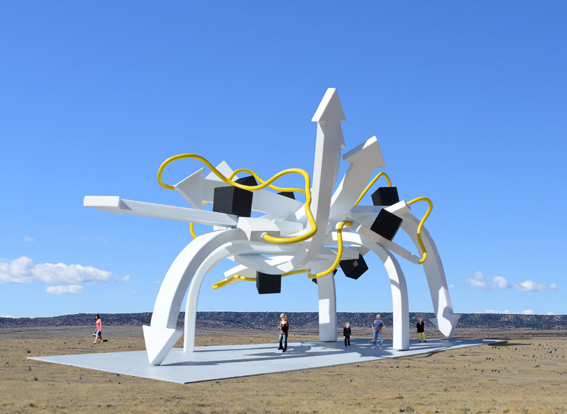 steel arrows, rods, and cubes intertwine to form michael jantzen's vast protein pavilion