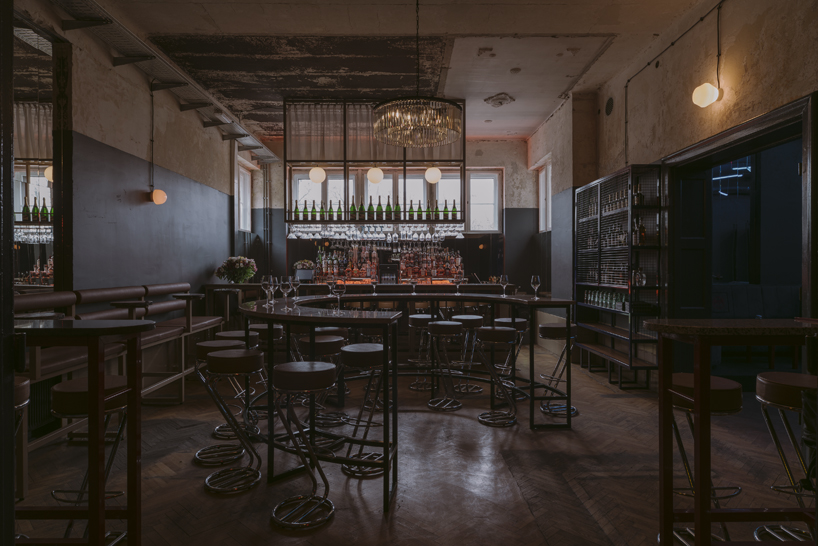 wiercinski studio mixes antiques with neon lighting to design vanity nightclub in poland designboom