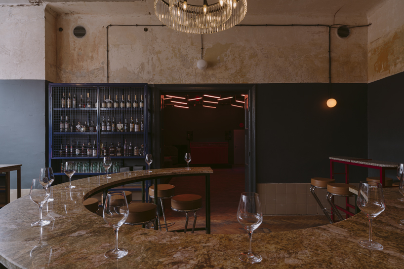 wiercinski studio mixes antiques with neon lighting to design vanity nightclub in poland designboom