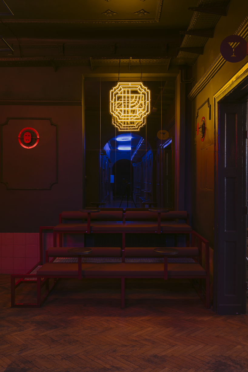 wiercinski studio mixes antiques with neon lighting to design vanity nightclub in poland designboom