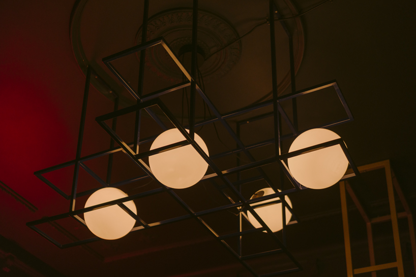 wiercinski studio mixes antiques with neon lighting to design vanity nightclub in poland designboom