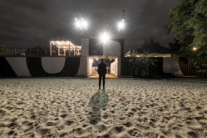 wiercinski studio recycles shipping containers for cultural center in poland designboom