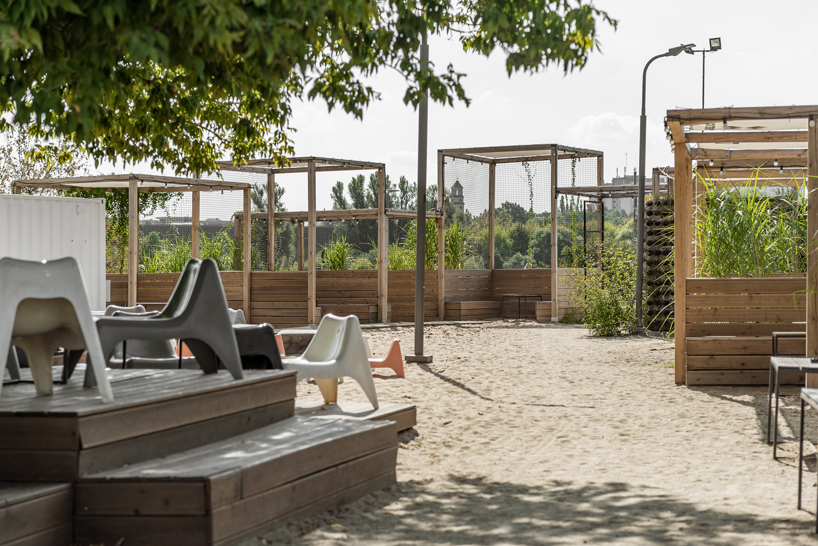 wiercinski studio recycles shipping containers for cultural center in poland designboom