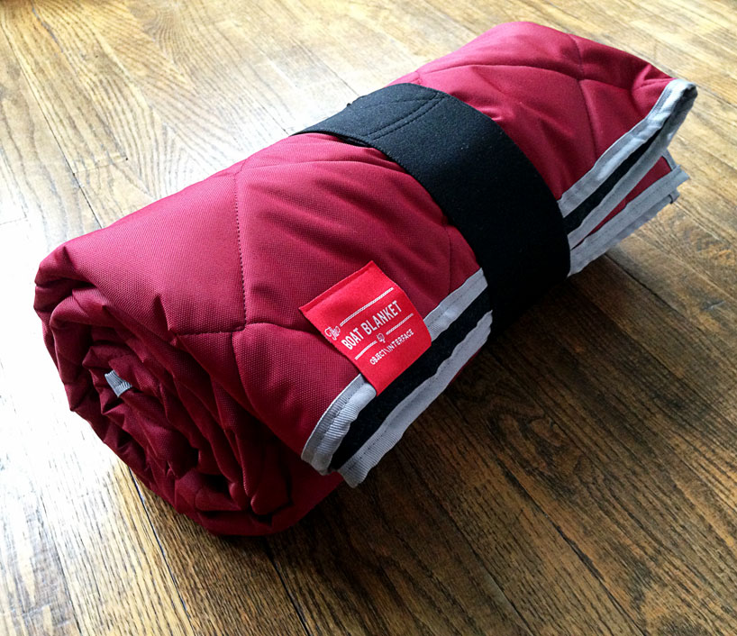 boat blanket keeps you warm + dry with wool and waterproof surfaces