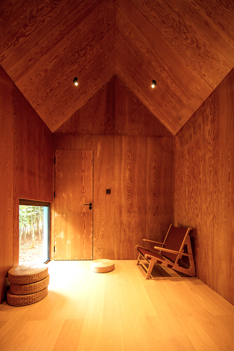 double slope roof tops wiki world's blue wooden cabin engulfed in chinese forest