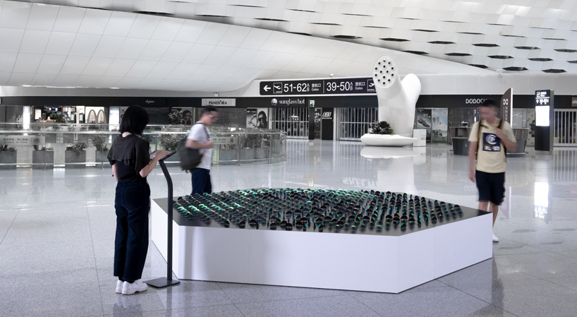 the shimmering pulse is a kinetic data sculpture created by panGenerator designboom