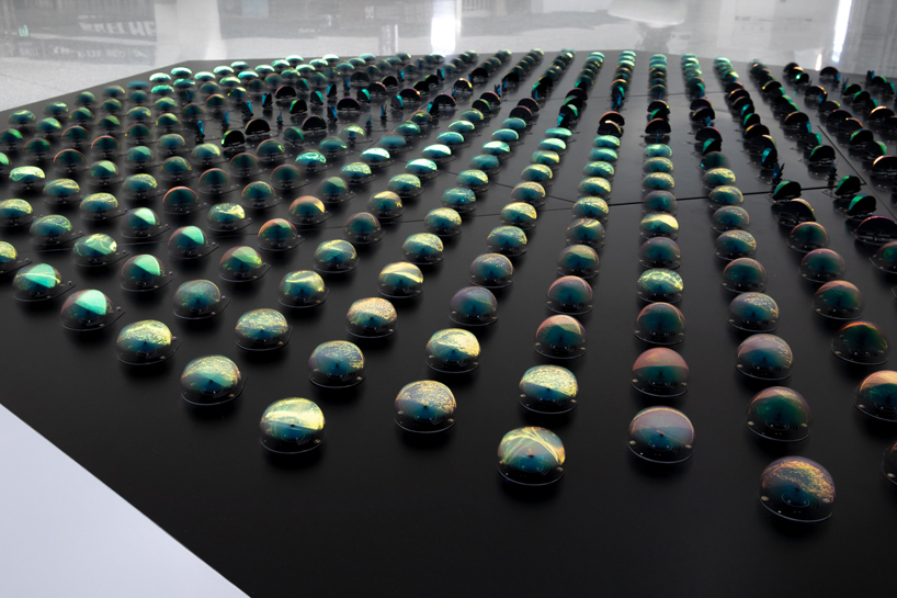 the shimmering pulse is a kinetic data sculpture created by panGenerator designboom