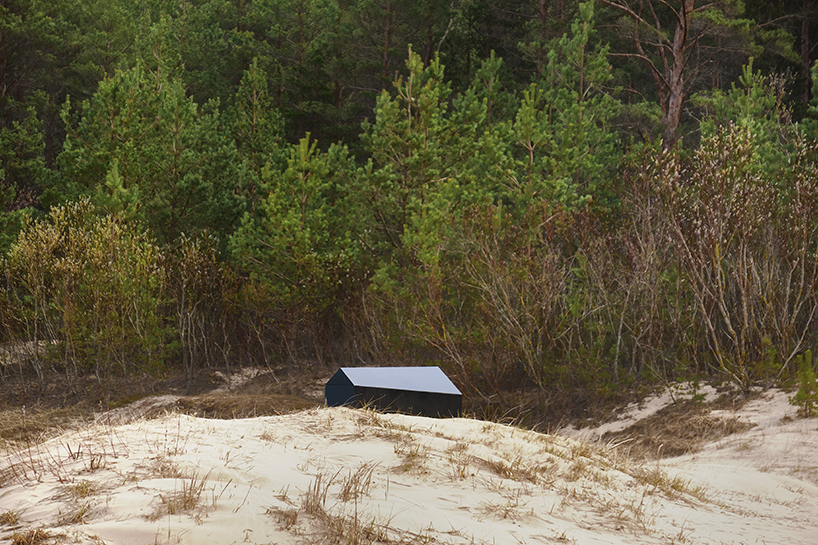 NRJA designs a black, house-shaped coffin for architects designboom