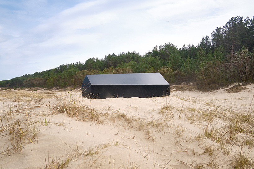 NRJA designs a black, house-shaped coffin for architects designboom