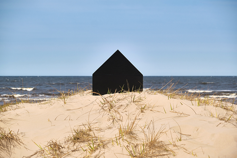 NRJA designs a black, house-shaped coffin for architects designboom