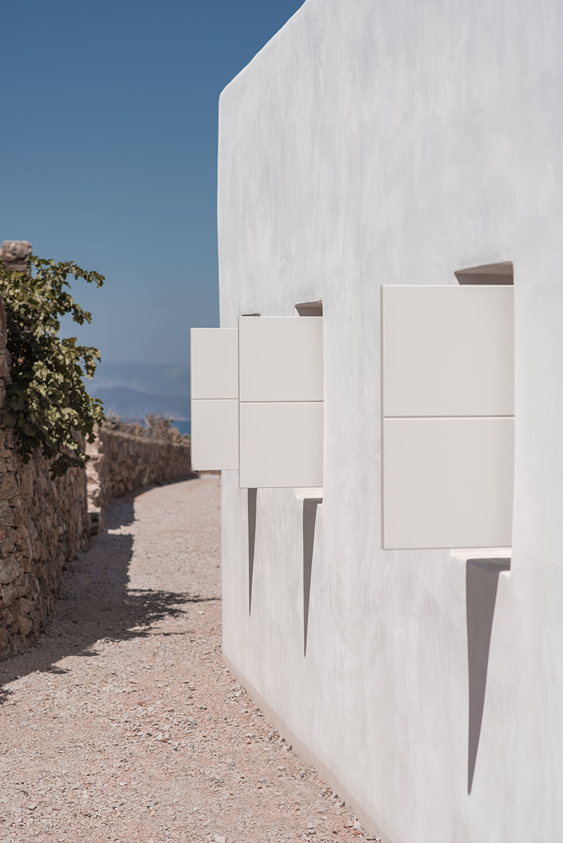mc house is a summer retreat embedded in the mediterranean landscape in greece 10