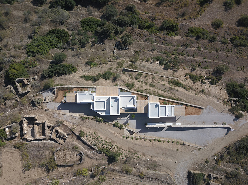 mc house is a summer retreat embedded in the mediterranean landscape in greece 2