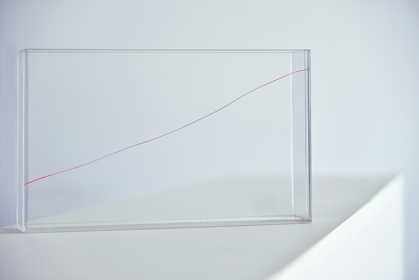 kazuhiro yamanaka colors and repurposes broken glass into unique vases