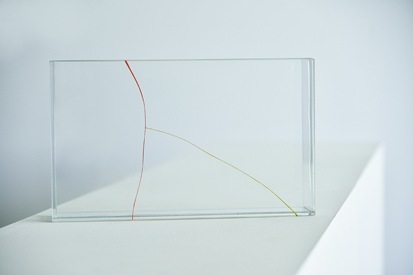 kazuhiro yamanaka colors and repurposes broken glass into unique vases