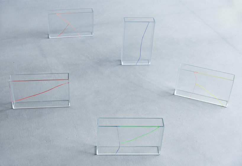 kazuhiro yamanaka colors and repurposes broken glass into unique vases