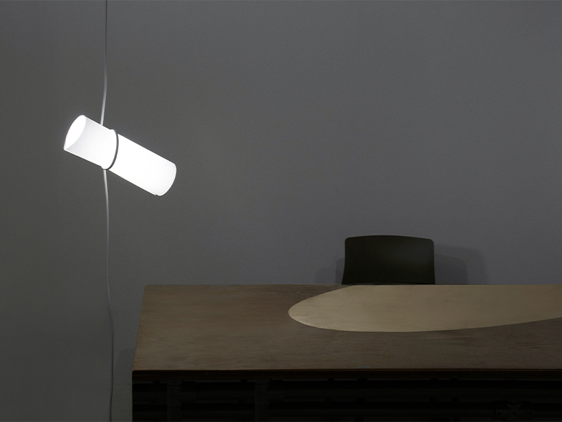 kazuhiro yamanaka designed the simplest lamp using a just a piece of a3 paper with a single electric cable 3
