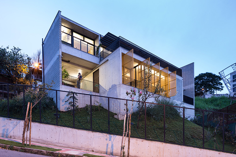 marcos franchini steps concrete volumes to build a house and wine tasting space in brazil designboom
