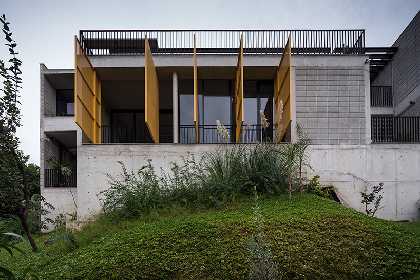 marcos franchini steps concrete volumes to build a house and wine tasting space in brazil designboom