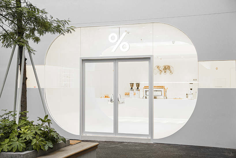 ARCHIEE's white minimalist coffee store fuses japanese, chinese, and parisian cultures
