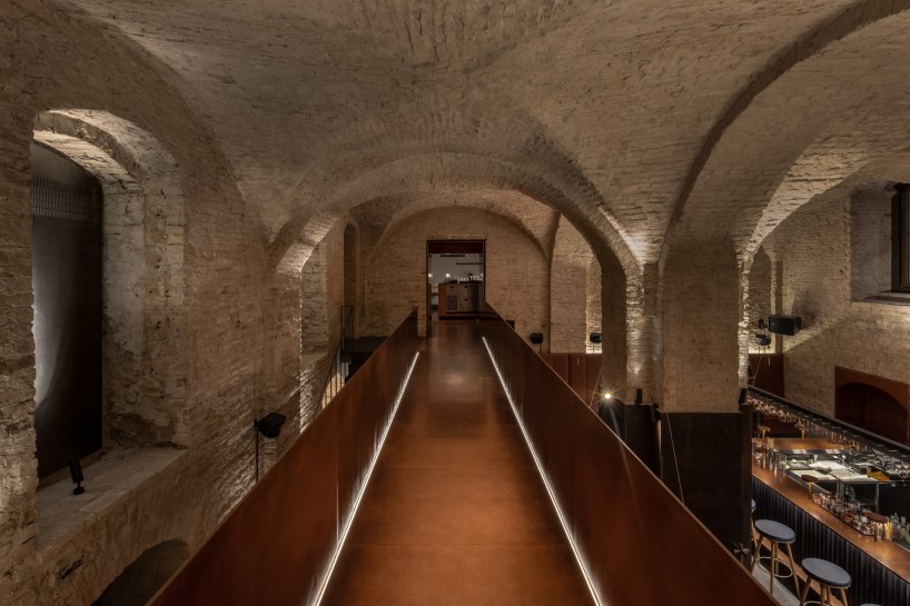 yod group rethought a historical building in central kyiv by creating there a restaurant with a copper bridge 3