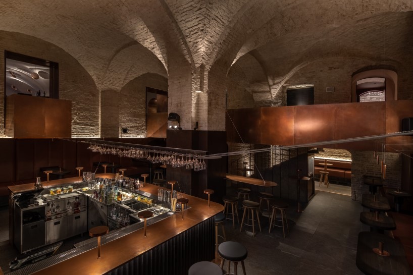 yod group rethought a historical building in central kyiv by creating there a restaurant with a copper bridge 4