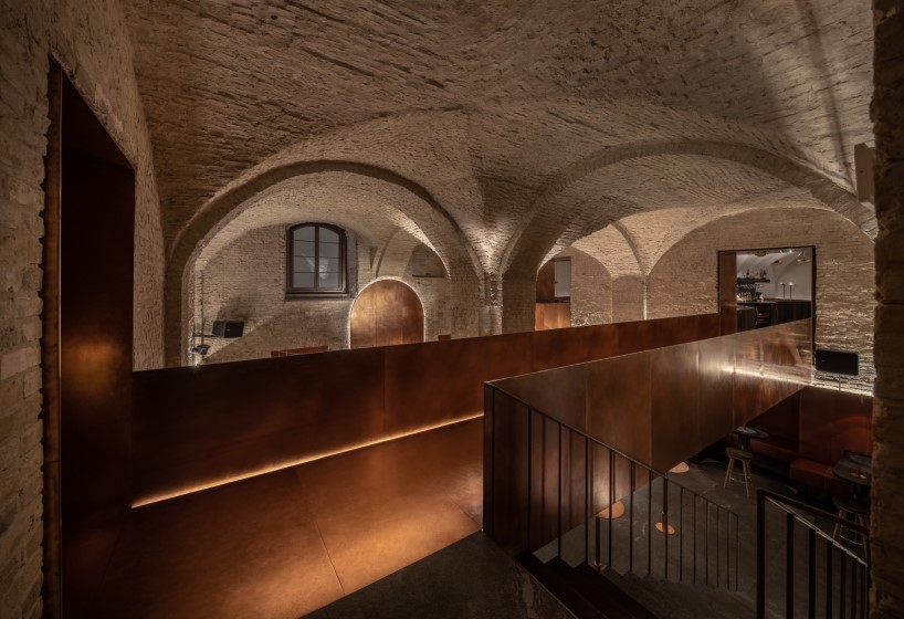 yod group rethought a historical building in central kyiv by creating there a restaurant with a copper bridge 6