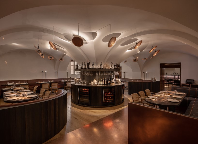 yod group rethought a historical building in central kyiv by creating there a restaurant with a copper bridge 9